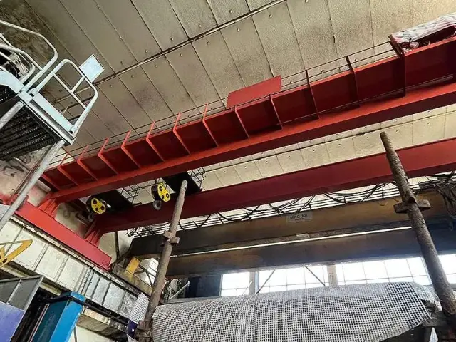 NanoPrep being applied by airless spray to an overhead crane