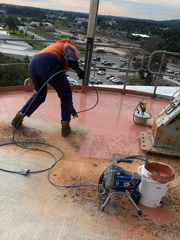 NanoPrep being applied to silo roof by spray
